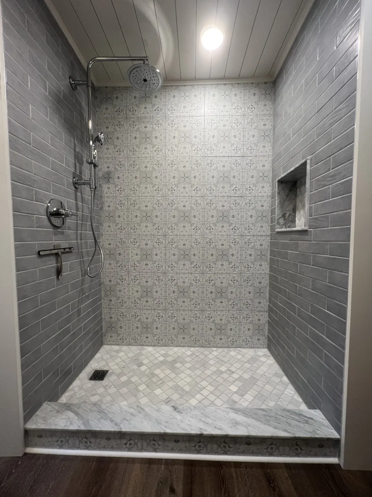Patterned-tile walk-in shower
